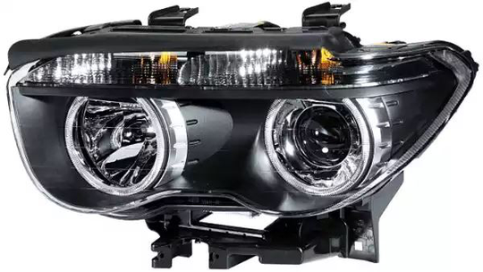 Headlight 12V 1EL158083-011 by Hella Left
