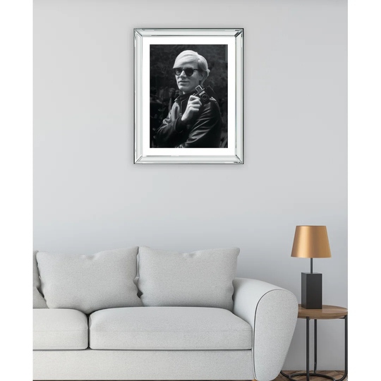 Andy Warhol in His Leather Jacket Holding His Camera - Photograph on Wood